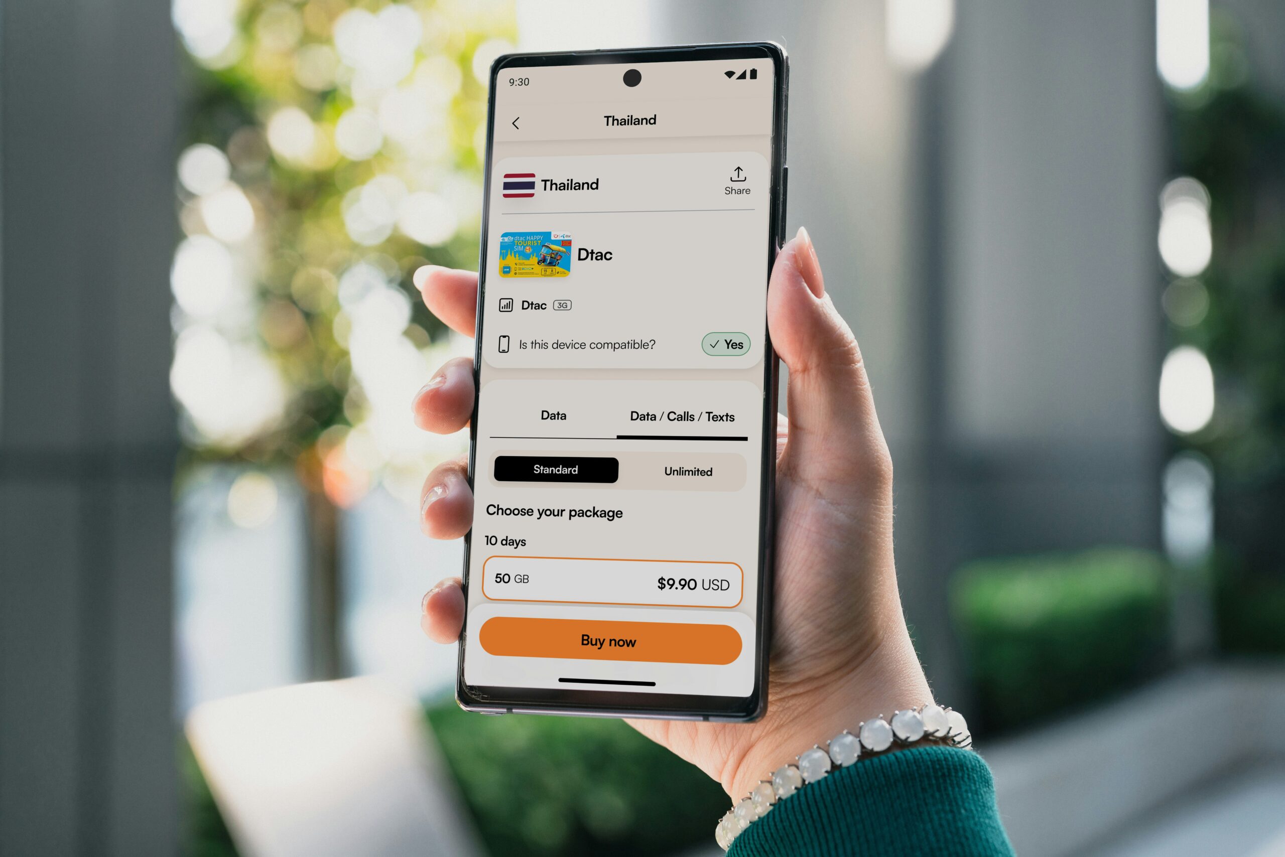 Traveler using eSIM technology to activate a local plan